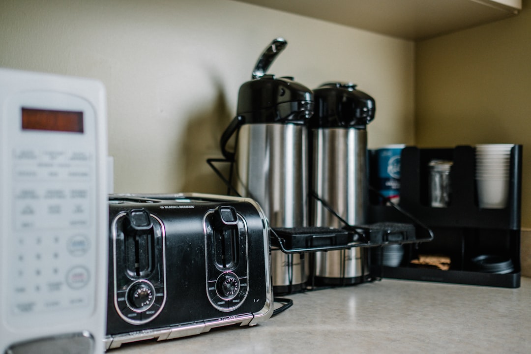 modern, well-stocked vacation rental kitchen with high-end coffee maker
