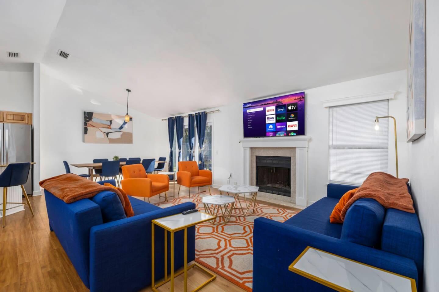 A spacious and modern living room in a Gainesville vacation rental, perfect for families.