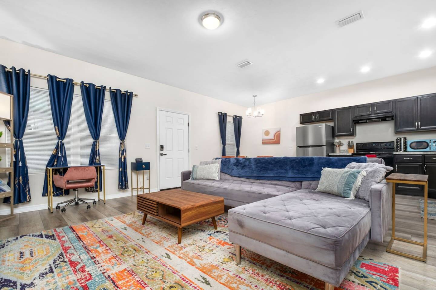 A bright, clean kitchen in a townhome rental within walking distance to the University of Florida.