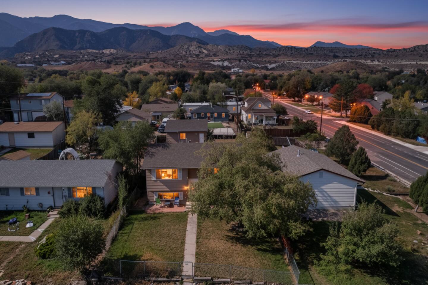 View from a Springline Stays property deck with mountains in the background