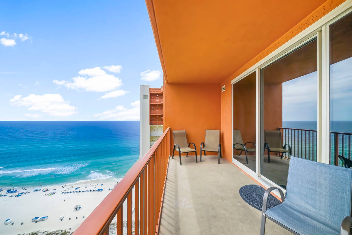 A beachfront condo with stunning ocean views from the balcony.